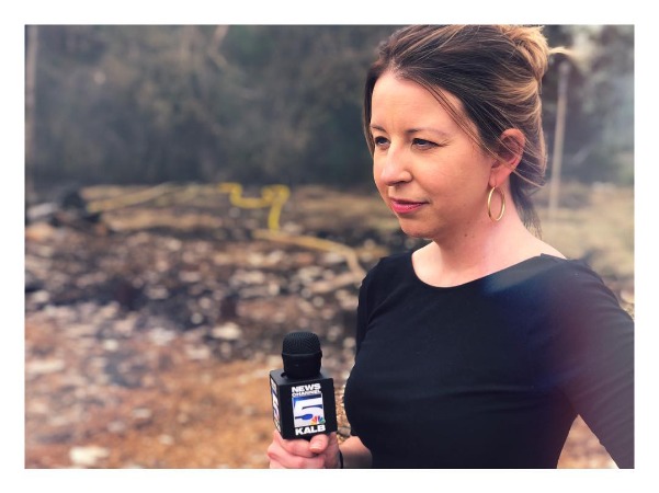 Brooke Buford is wearing a formal black dress and reporting her routine news portal.
